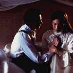 Jeremy Irons, John Lone