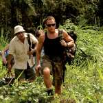 Rob Huebel, Jean-Claude Van Damme, Aaron Takahashi