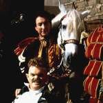 Winston Dennis, Eric Idle, Jonathan Pryce, Jack Purvis