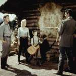 Marilyn Monroe, Robert Mitchum, Tommy Rettig, Rory Calhoun