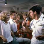 Tom Cruise, Whip Hubley, Kelly McGillis